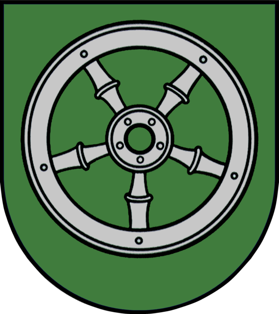 Das Wappen des Ortsteiles Schwarzenholz in Form eines Schildes. Grüner Hintergrund mit einem grauen Wagenrad mit fünf Speichen in der Mitte.